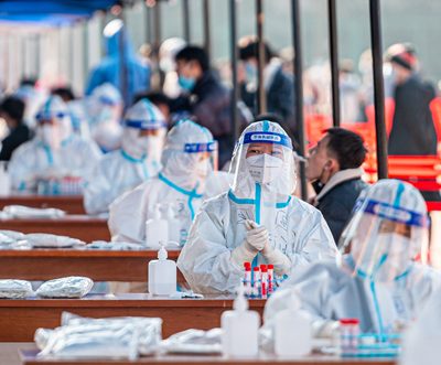 In China's Henan province, 90 percent of people are infected with Covid