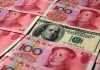 China buys Yuan by selling dollars