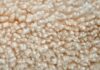 Australian wool prices fall due to uncertainty in foreign exchange fluctuation