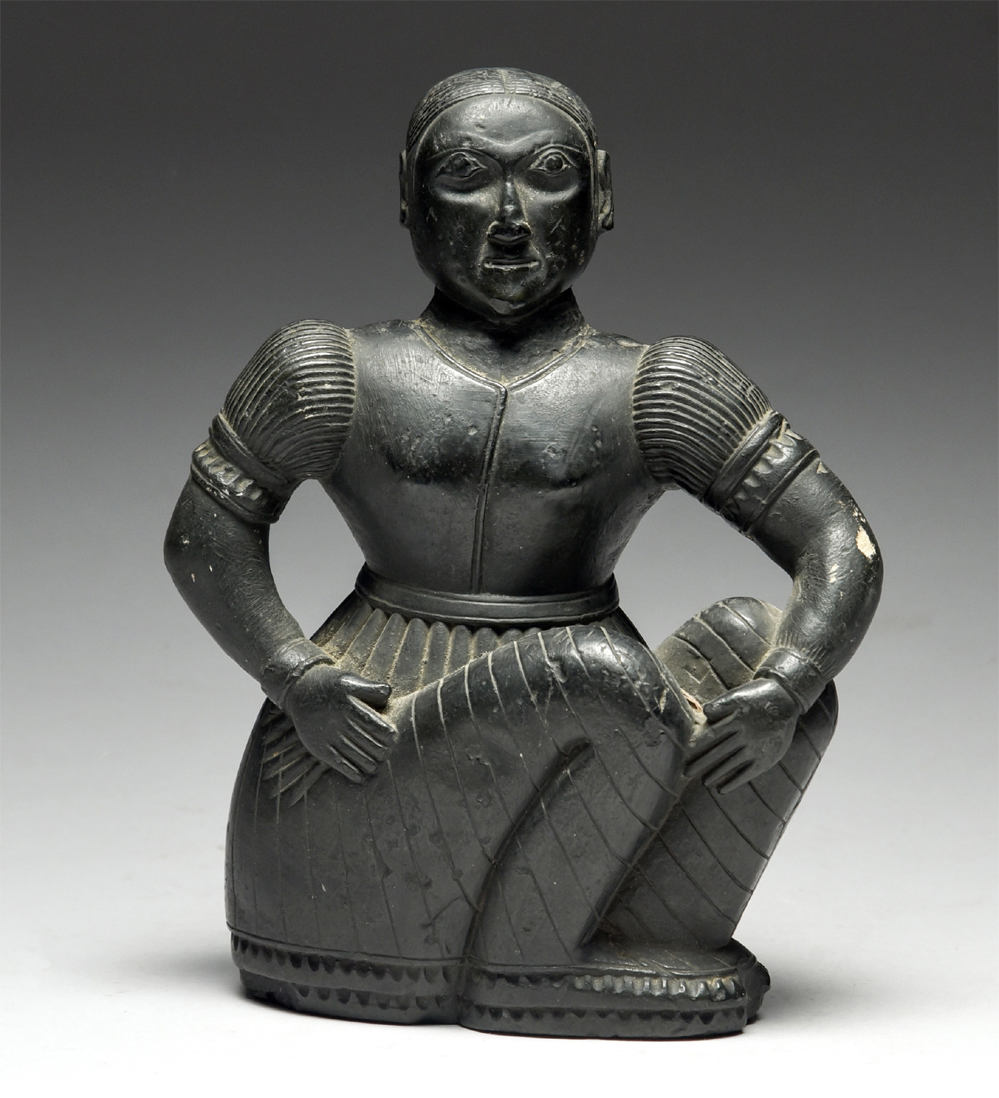 A rare carved Haida figure of a seated woman Estimate £4,000-£6,000 (lot 320)