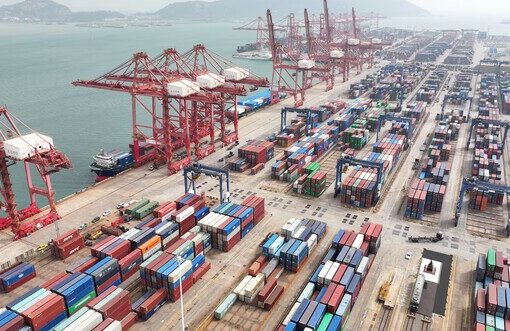 China to cut import tariffs on 935 items from January to boost demand and openness