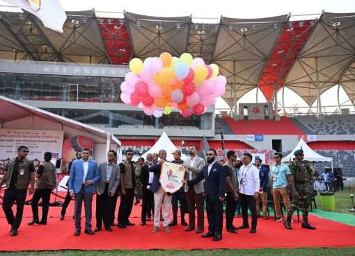 Image Alt Text: Athletes compete at the 18th COCO National Summer Athletics Competition at Dhaka National Stadium, Bangladesh.